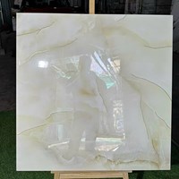 Đá đồng chất khắc kim Trung Quốc 100x100 kem vàng vân đá
