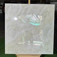 Đá đồng chất Trung Quốc 100x100 xám kem nhũ bạc