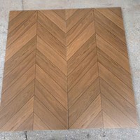 Gạch giả gỗ Trung Quốc 60x120 xương cá nâu đậm mờ