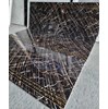 Gạch lát cầu thang 47x120 đen vân đá vàng sang trọng